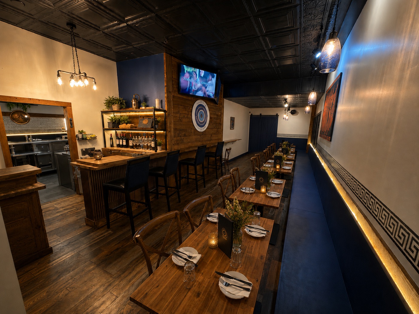 The candle-lit dining room at Yamas, set for dinner service